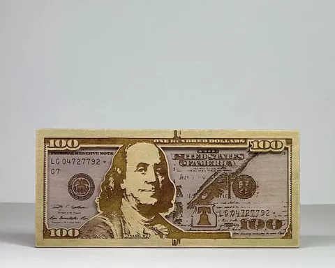 One Hundred Dollars layered-art product photo